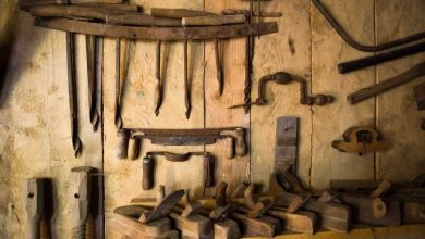 shutterstock 77260183 rusty old woodworking tools on the wall of an old workshop