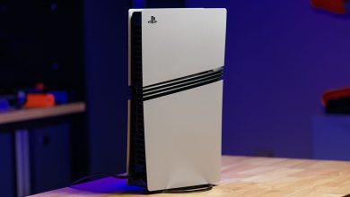 The PS5 Pro, a new PlayStation in white, with black  strakes along its sides.