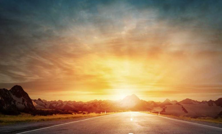 shutterstock 293703398 driving into the sunset sunrise dawn dusk road