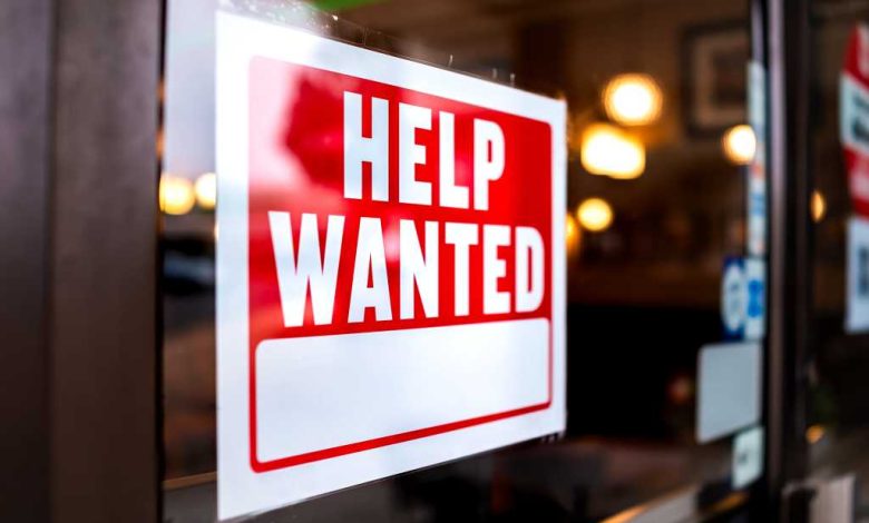 shutterstock 1840085851 help wanted sign in office window