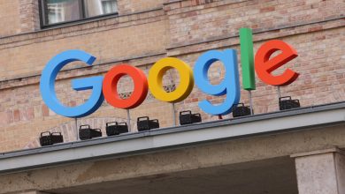 Google corporate logo hangs outside the Google Germany offices