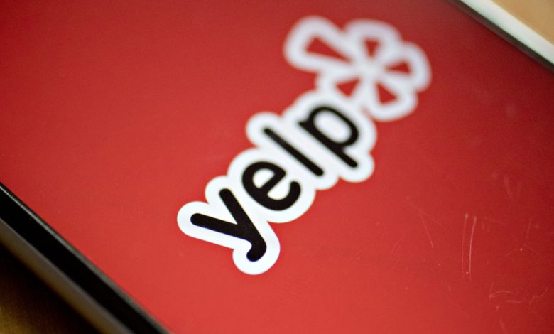 The Yelp Inc. application is displayed on for a photograph an iPhone.