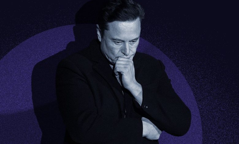 Elon Musk pontificates against a spotlight and blue background