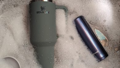 stanley cup and bottle soaking in water