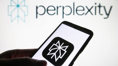 Perplexity AI logo is seen on a smartphone and on a PC screen.