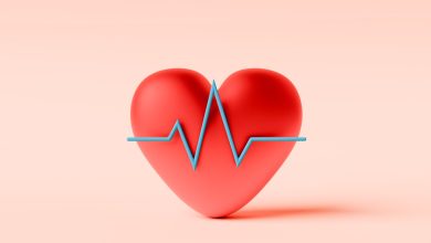 Conceptual image of a red heart with a line graph in front symbolizing Heart or ECG