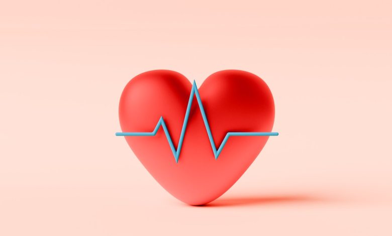 Conceptual image of a red heart with a line graph in front symbolizing Heart or ECG